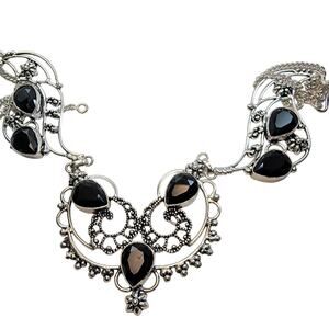 Handmade Sterling Silver Necklace with Black Onyx Gemstones and Floral Accents